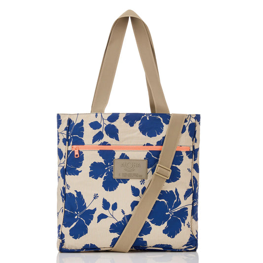 Floral tote bag with beige strap on a white background
