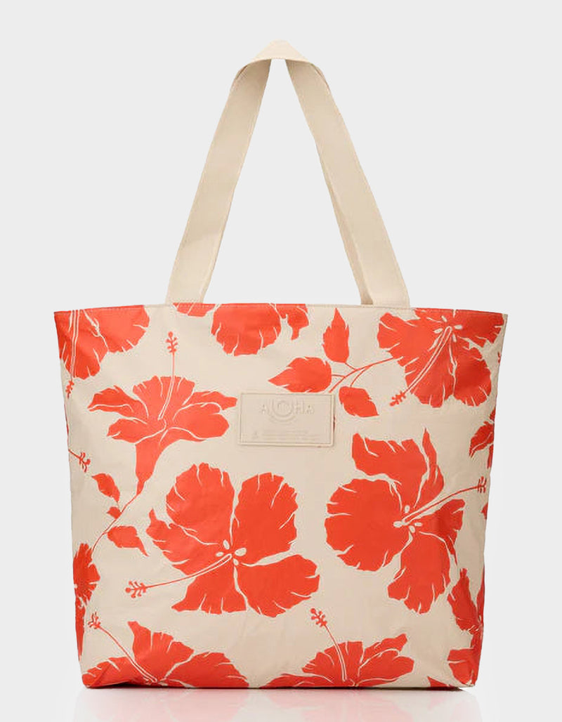 Tote bag with red floral pattern on a beige background