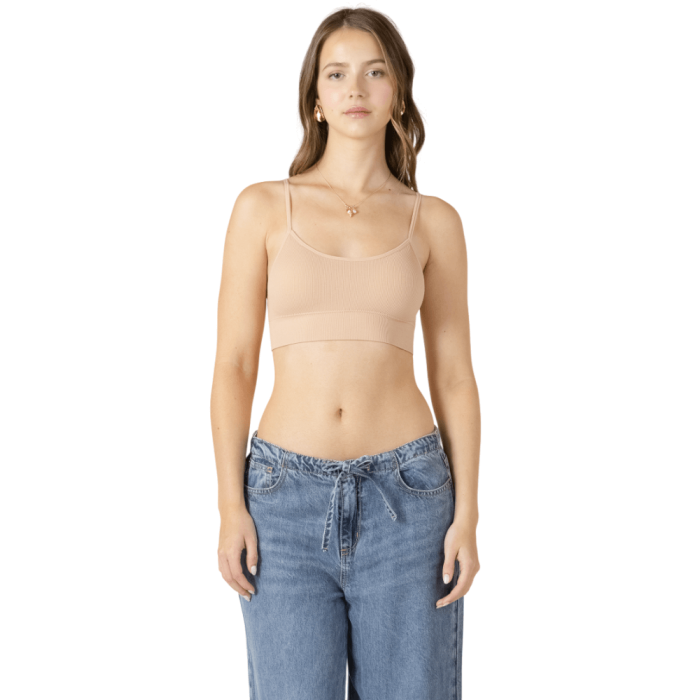 Woman in nude tank bra.