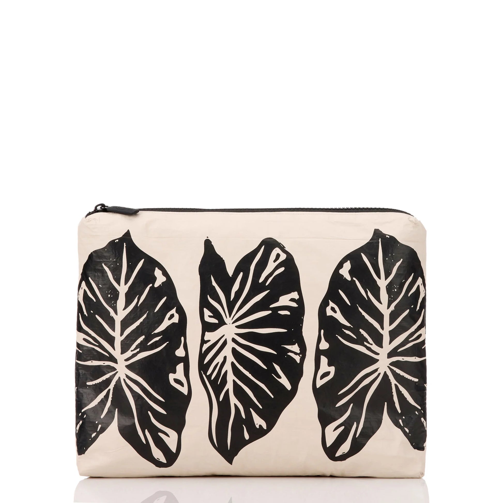 Beige pouch with black leaf patterns on a white background